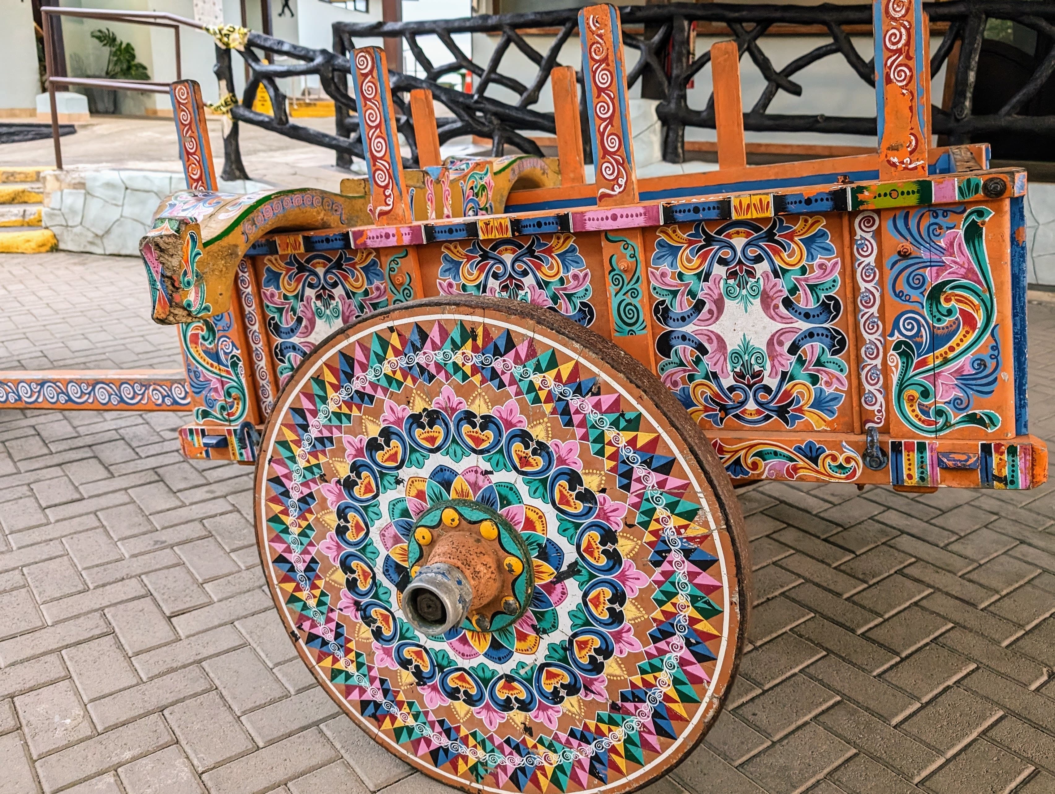 A brightly painted oxcart. Alajuela.